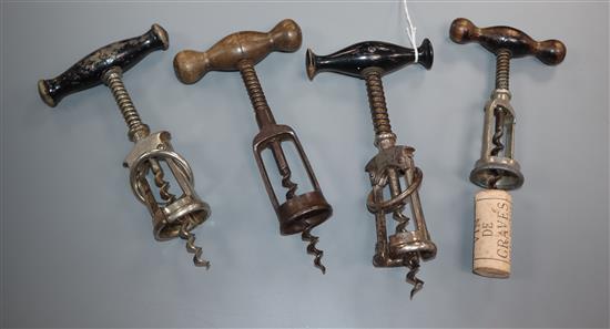 Four German coiled spring steel corkscrews, late 19th, early 20th century